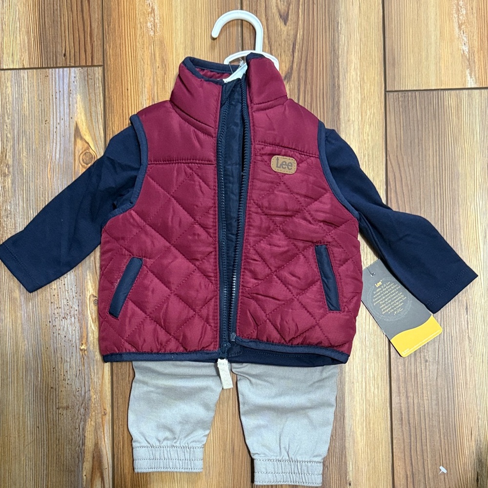 Lee Maroon Quilted Vest with Dark Blue Sleeves and Light Khaki Pants